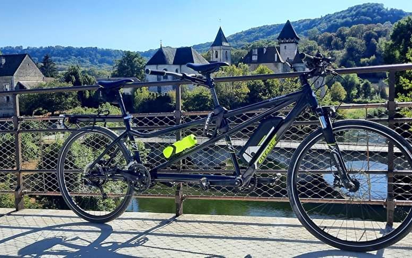 On Courbet's land on an electric tandem